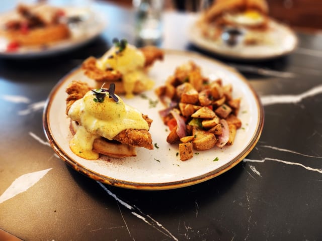 Signature Eggs Benedict.